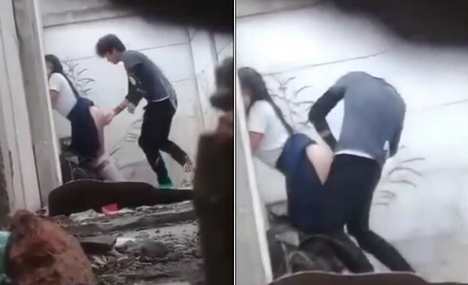 alumnos de prepa grabados mientras que cogen atras de los salones